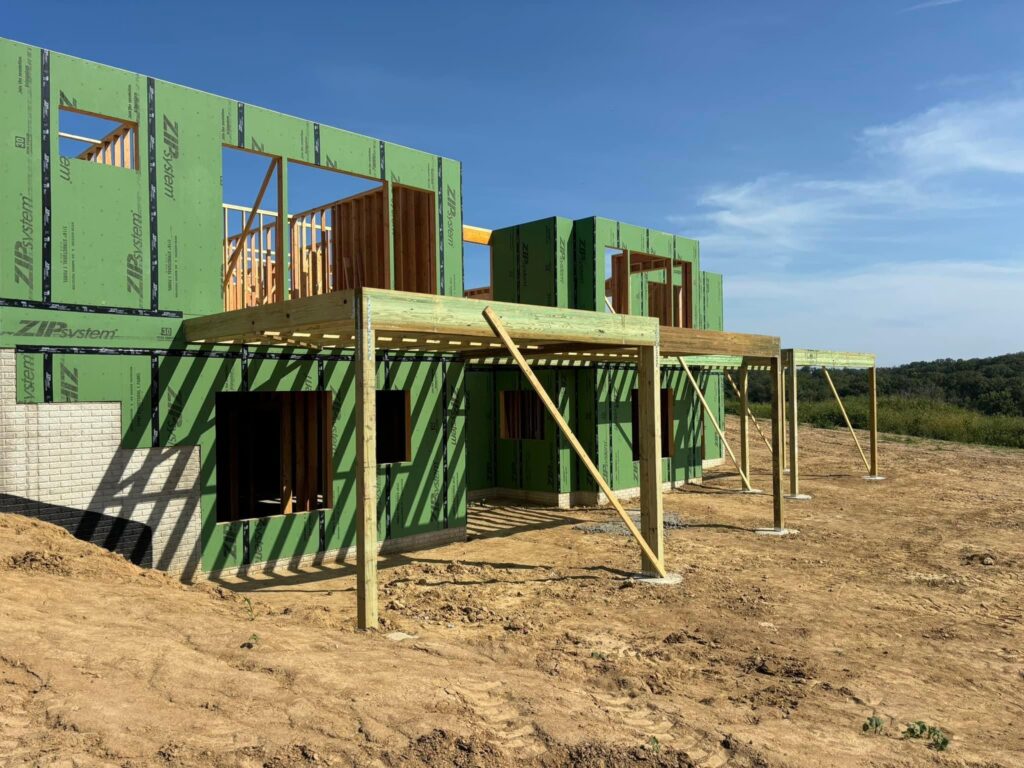 Structural deck framing and outdoor living area construction by Austin custom builder
