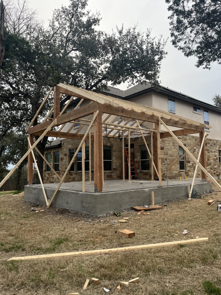 Cedar gable patio cover under construction in Austin, TX