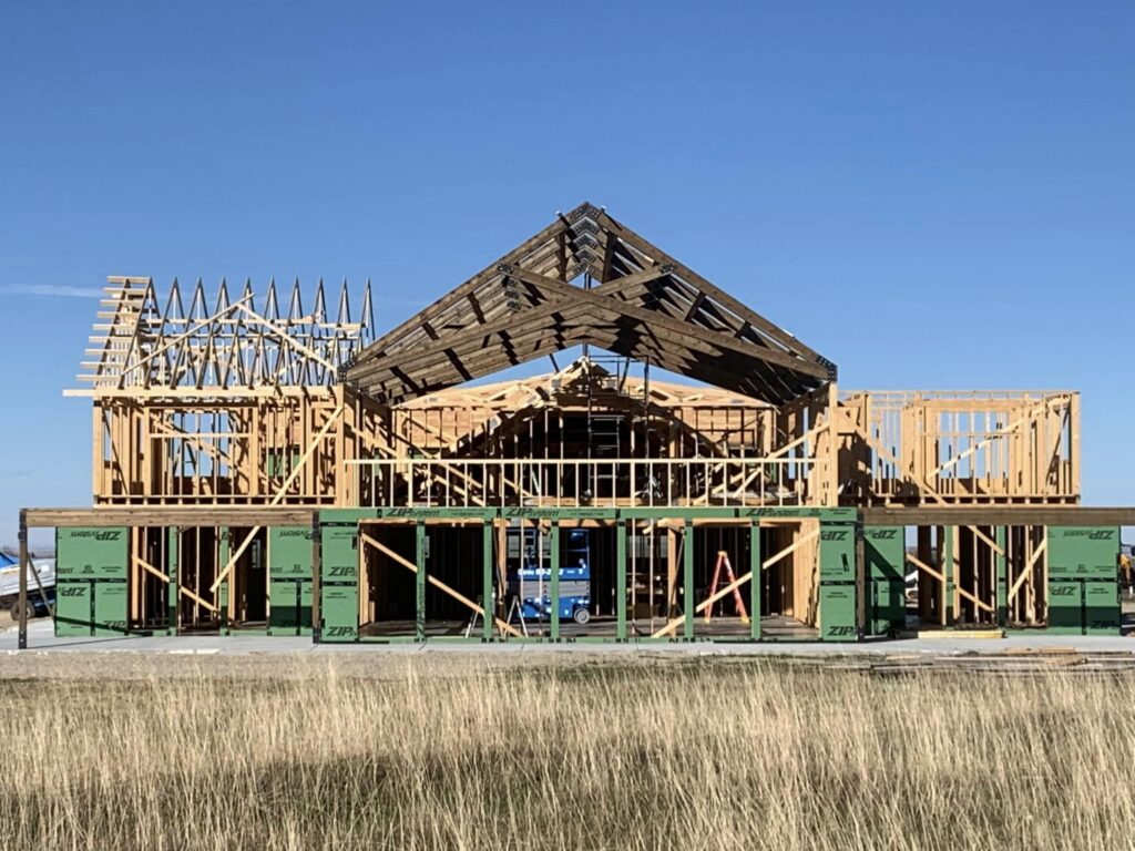 Large custom home framing project during structural construction in Austin, TX