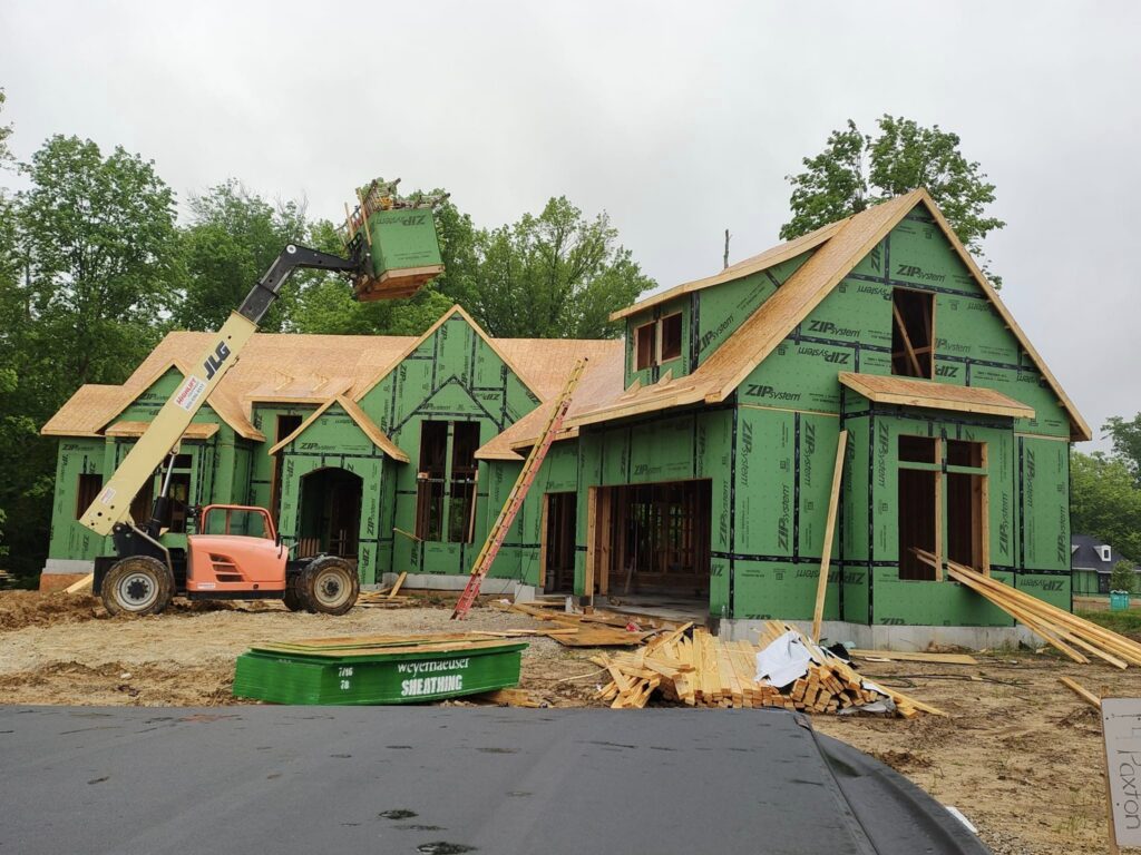 Large custom home structural framing and exterior sheathing in progress