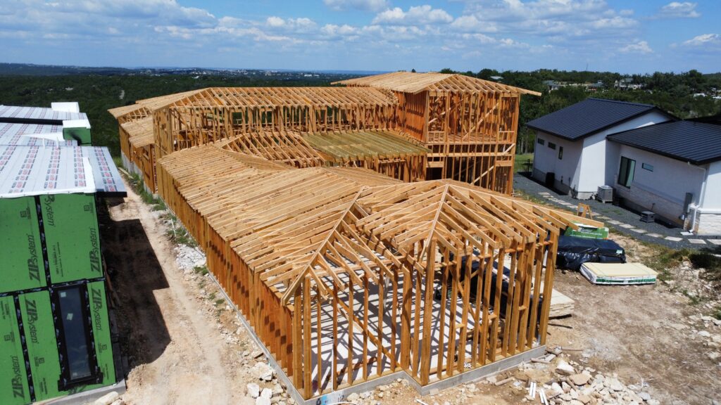 Luxury home wood framing and structural construction captured by drone in Austin Texas