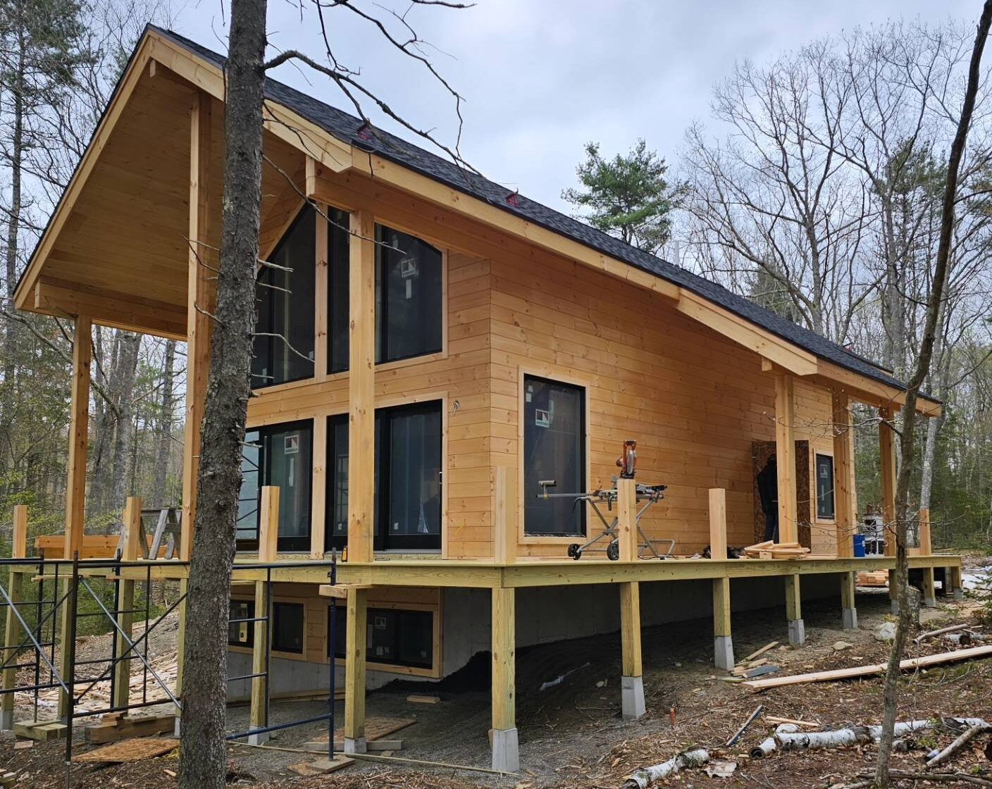Luxury wood-clad custom home framing and exterior construction project in Austin, Texas
