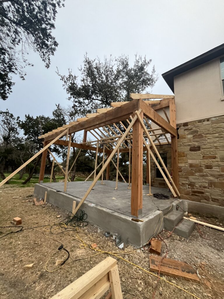 Custom cedar patio cover construction project in Austin, Texas