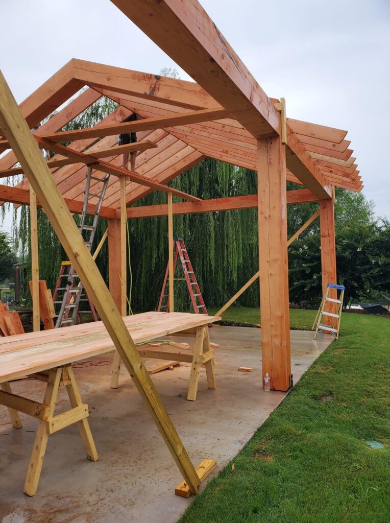 Heavy timber outdoor pavilion construction project completed by Austin custom builder